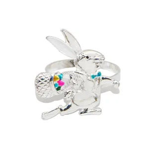 Anello portatovagliolo con coniglietto di Pasqua in metallo argentato e uova colorate.