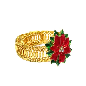 Detailed view of gold spring curtain tieback with red poinsettia flower and rhinestone detail.