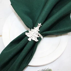 Silver Christmas tree napkin ring detail view table decor holiday dining accessory elegant look.