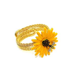 Detailed view of creative spring curtain tieback featuring vibrant yellow daisy and rhinestone bee.