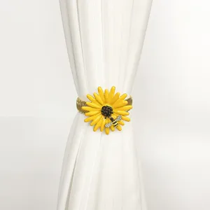 Metal spring curtain tieback featuring yellow daisy and bee decor for home decor.
