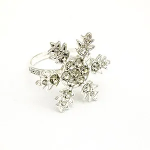 Silver rhinestone snowflake napkin ring elegant table decor for Christmas holiday party dining.