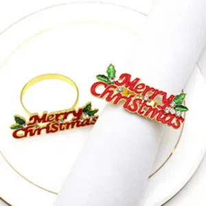 Ronds de serviette de Noël avec texte rouge et strass cristaux pour décoration de table.