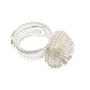 Close-up shot of the silver metal wire woven curtain ring and decorative ball detail.