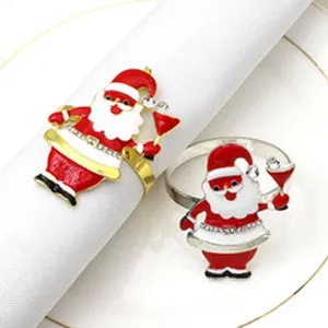 Christmas Santa Claus napkin rings with rhinestones and enamel for table decor table setting.