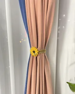 Creative yellow daisy curtain tieback with metal spring band for home window decor.