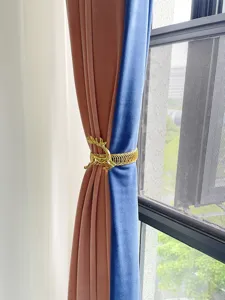 Gold deer curtain tieback detail view, elegant spring drapery buckle for home decor.