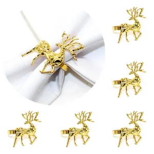 Detailed view of gold geometric reindeer napkin ring, elegant table decor showcase.