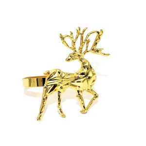 Gold geometric reindeer napkin ring for elegant Christmas dinner table decor and party.