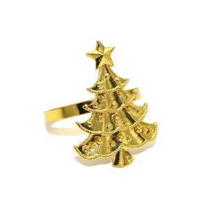 Gold metal Christmas tree napkin ring for holiday table decor and dining room setting.