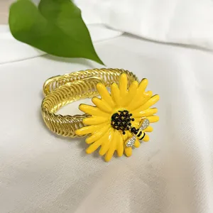 Golden spring curtain tieback with yellow daisy and crystal bee decoration for home decor.