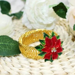 Christmas gold metal curtain tieback with red enamel poinsettia flower and crystal rhinestones.
