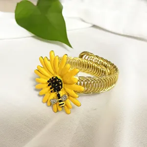 Gold metal spring curtain tie back with yellow daisy and bee decor for home decor