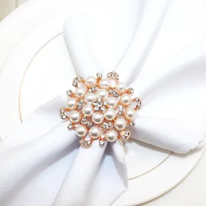 Elegant pearl and rhinestone napkin ring holder for hotel table decor, stunning flower design.