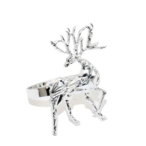 Silver geometric reindeer napkin ring for Christmas dining table decoration and party setup.