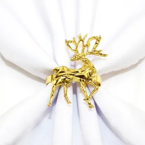 Gold geometric reindeer napkin ring, elegant metal deer napkin holder for Christmas table decor.