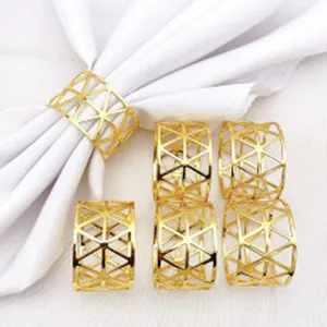 Gold metal napkin rings set, hollow geometric napkin holders for dining table and kitchen decor.