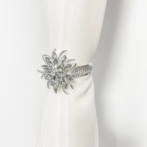 Crystal flower curtain tieback detail shot showing sparkling rhinestones and spring band.