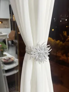 Crystal flower curtain tieback with sparkling rhinestones and flexible spring band for home decor.