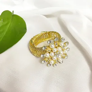 Elegant pearl flower curtain buckle with flexible spring alloy design for home decor styling.