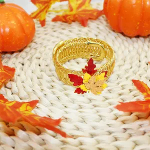Gold metal spring curtain tieback with vibrant maple leaf decor for autumn home decor.