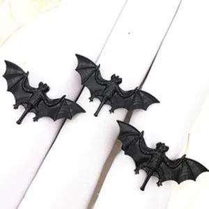 Detailed close-up view of the black bat napkin ring for spooky Halloween table decor.