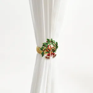 Christmas bell wreath curtain tieback metal buckle, detailed view showing holiday decor.