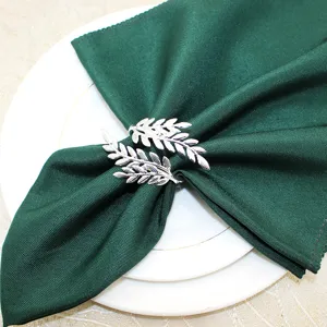 Exquisite silver leaf napkin ring detail shot, metal leaf napkin holder for table decor.