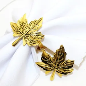 Exquisite antique gold maple leaf napkin rings detail shot, elegant table decor for dining.