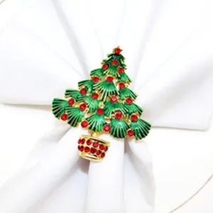 Christmas tree napkin ring detail shot, green enamel and red crystal alloy table decor accessory.