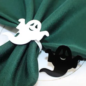 Halloween ghost napkin rings, black and white ghost napkin holders for table decor details.