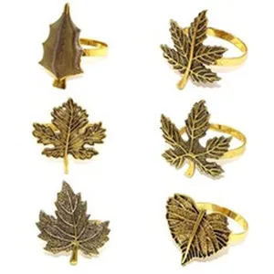 Vintage gold leaf napkin rings set featuring six unique autumn designs for table decor