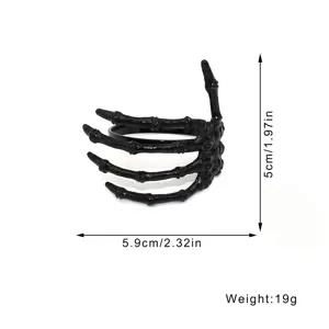 Black skeleton hand napkin ring detail showing exact height and width dimensions clearly.