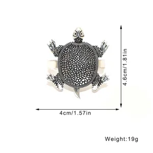 Detailed dimension view of vintage metal turtle napkin ring showing size and weight specs.