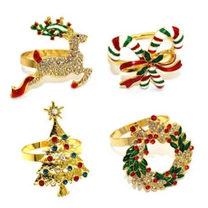 Christmas alloy rhinestone napkin ring set detail showing reindeer tree wreath design.