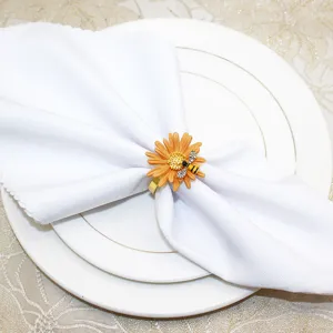 Portatovaglioli margherita con ape strass, elegante accessorio per tavola da festa chic.