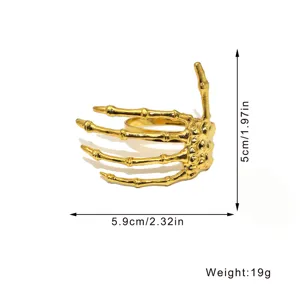 Gold skeleton hand napkin ring for Halloween table decor, gothic dining table accessory