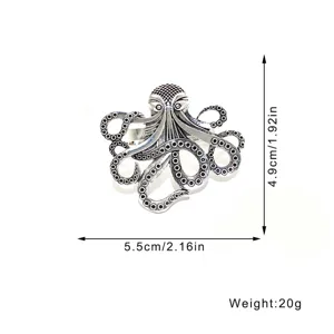 Details of the vintage metal octopus napkin ring with fine tentacle textures and dimensions.