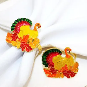 Thanksgiving turkey and maple leaf alloy napkin ring for festive table decor and dinner parties.