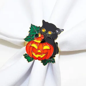 Halloween black cat pumpkin napkin ring, metal alloy table decor for holiday party dinner.