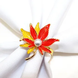 Autumn maple leaf napkin ring with pearl detail, gold metal alloy holder for table decor.