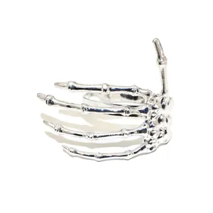 Silver skeleton hand napkin ring for Halloween table decor, gothic holiday party dining accessory.