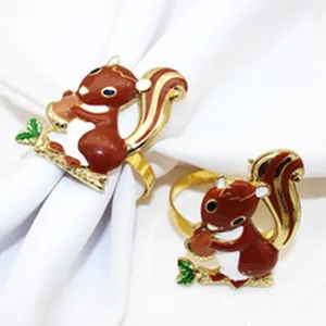 Cute squirrel napkin rings alloy gold brown autumn table decor for dinner party.