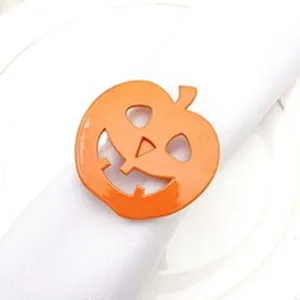 Close up detail of orange pumpkin napkin ring for Halloween table decoration and dining.