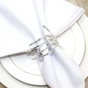 Silver skeleton hand napkin ring for Halloween party table decoration and dinner settings.