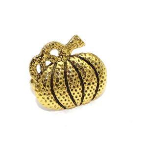 Close-up detail of the antique gold alloy pumpkin napkin ring with hammered textured finish.