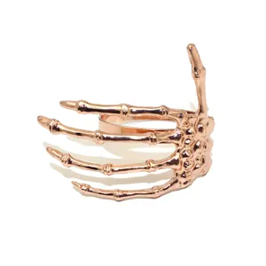 Rose gold skeleton hand napkin ring, spooky Halloween table decor metal napkin holder.