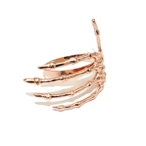 Rose gold skeleton hand napkin ring, spooky Halloween table decor and gothic creative ring.