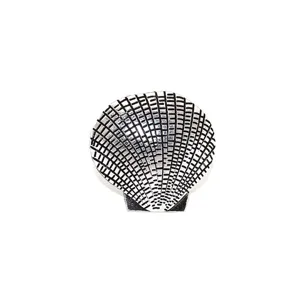 Vintage metal shell napkin ring for summer ocean themed dining table decor and party settings.