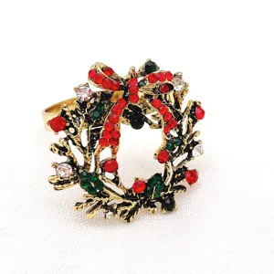 Christmas rhinestone napkin ring, antique gold alloy wreath bow design for holiday table decor.